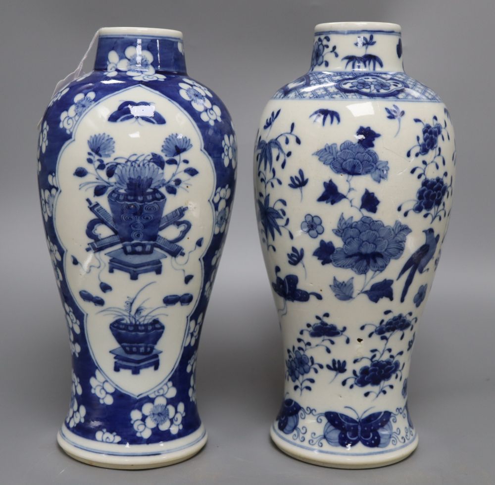 A 19th century Chinese blue and white hundred antiques vase and a Chinese blue and white vase, tallest 31cm